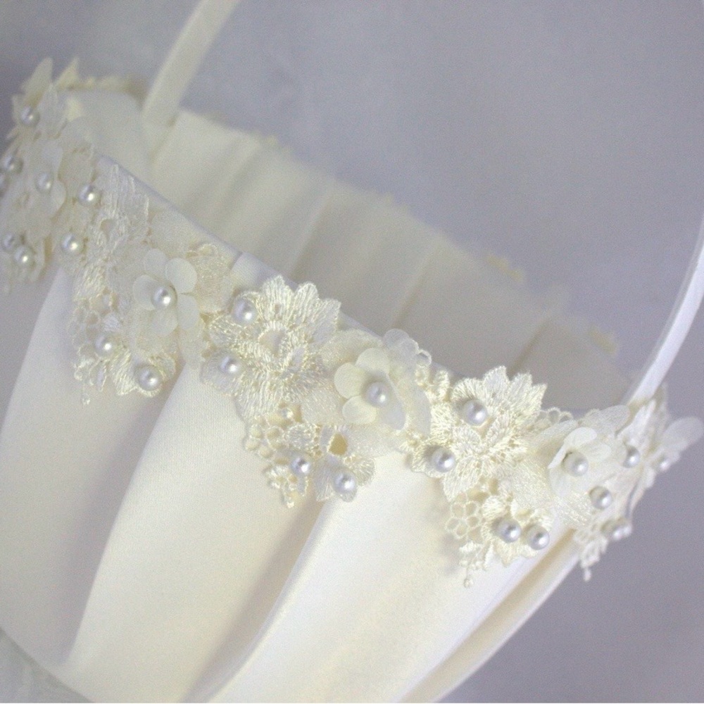 New flower girl basket, never used. Ivory color with ivory trim.
